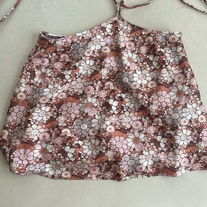 Floral print by neck blouse